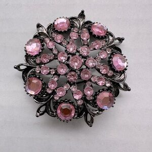 Vintage pink flower brooch on black metal
